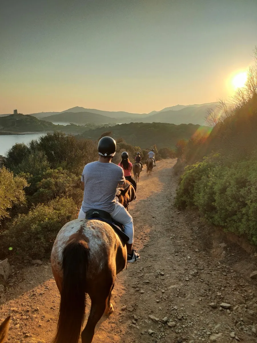 Horseback riding at sunset near Chia